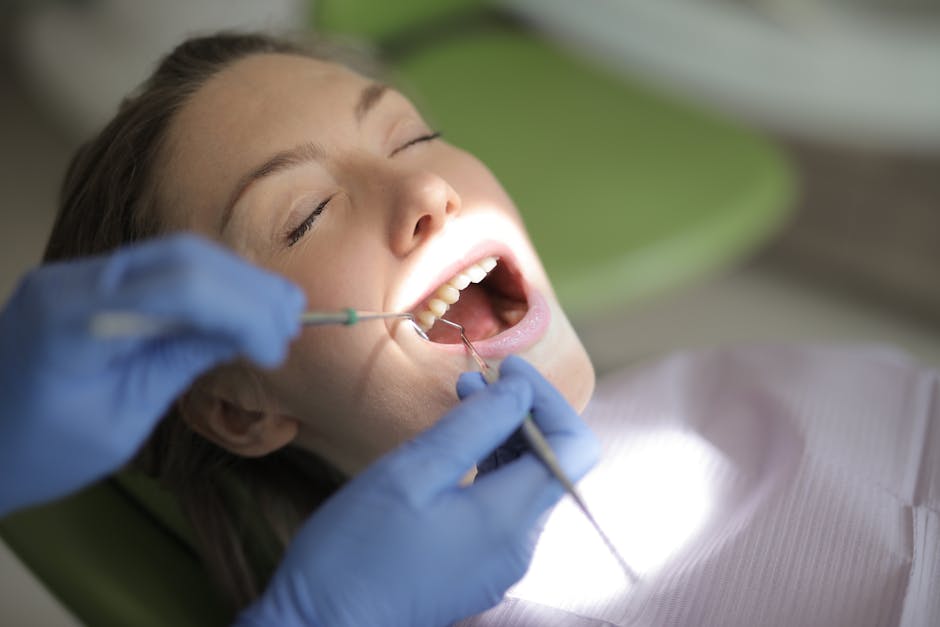 woman getting her teeth cleaned